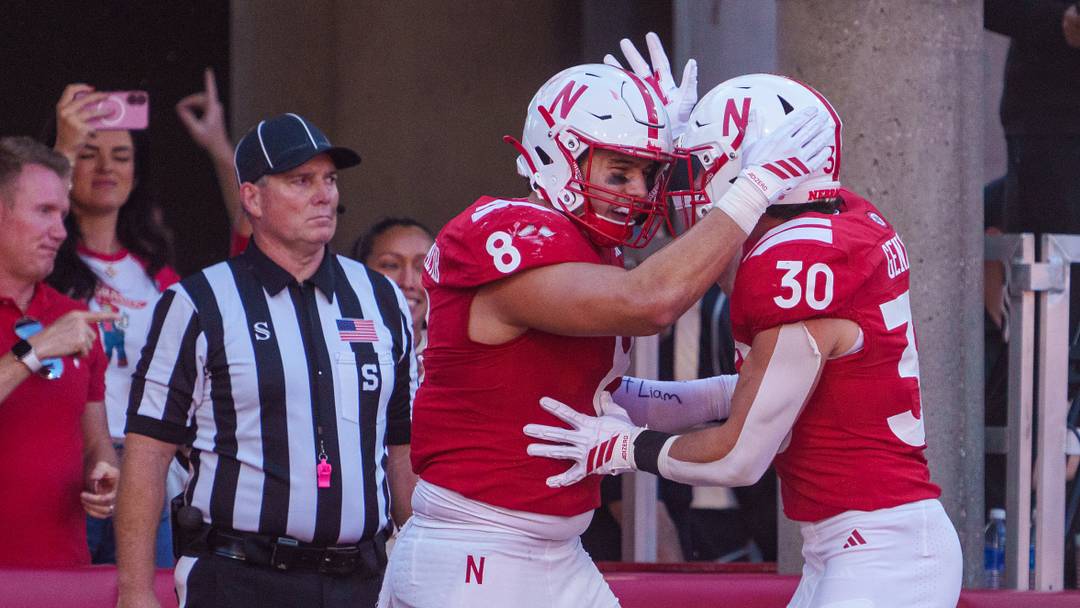 Oct 3, 2026; Lincoln, Nebraska, USA; Nebraska Cornhuskers tight end Luke Lindenmeyer (8) and running back Vincent Genatone (30) celebrate after a touchdown against the Maryland Terrapins during the second quarter at Memorial Stadium. Mandatory Credit: Dylan Widger-Imagn Images Oct 3, 2026; Lincoln, Nebraska, USA; Nebraska Cornhuskers tight end Luke Lindenmeyer (8) and running back Vincent Genatone (30) celebrate after a touchdown against the Maryland Terrapins during the second quarter at Memorial Stadium. Mandatory Credit: Dylan Widger-Imagn Images
