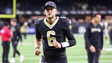 New Orleans Saints quarterback Tyler Shough (6) walks off the field