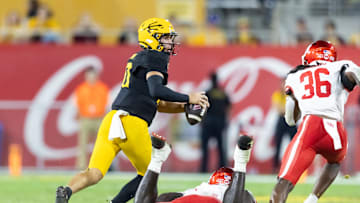 Oct 25, 2025; Tempe, Arizona, USA; Arizona State Sun Devils quarterback Sam Leavitt (10) scrambles against the Houston Cougars in the second half at Mountain America Stadium. Mandatory Credit: Mark J. Rebilas-Imagn Images