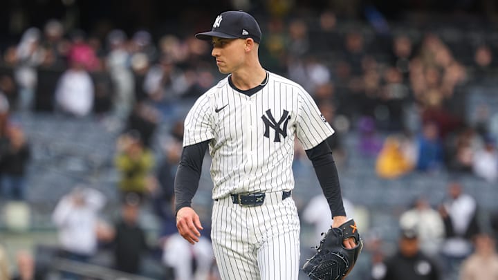 May 22, 2025; Bronx, New York, USA; New York Yankees relief pitcher Luke Weaver (30) reacts after closing the game against the Texas Rangers at Yankee Stadium. Mandatory Credit: Vincent Carchietta-Imagn Images