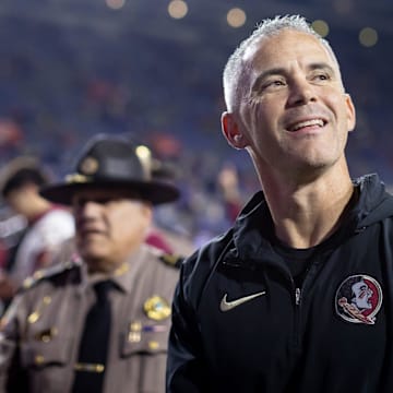 Florida State Seminoles head coach Mike Norvell smiles to the crowd after the game against the Florida Gators at Steve Spurrier Field at Ben Hill Griffin Stadium in Gainesville, FL on Saturday, November 25, 2023. [Matt Pendleton/Gainesville Sun]