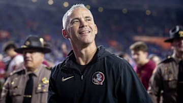 Florida State Seminoles head coach Mike Norvell smiles to the crowd after the game against the