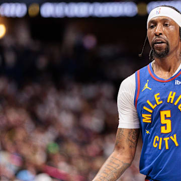 Denver Nuggets guard Kentavious Caldwell-Pope (5) walks off the court during the first quarter against the Los Angeles Lakers in game one of the first round for the 2024 NBA playoffs at Ball Arena. 