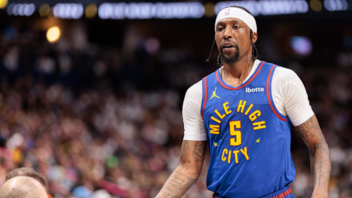 Denver Nuggets guard Kentavious Caldwell-Pope (5) walks off the court during the first quarter against the Los Angeles Lakers in game one of the first round for the 2024 NBA playoffs at Ball Arena. 