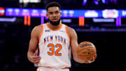 Jan 12, 2025; New York, New York, USA; New York Knicks center Karl-Anthony Towns (32) reacts during the first quarter against the Milwaukee Bucks at Madison Square Garden. 