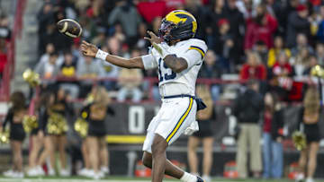 Nov 22, 2025; College Park, Maryland, USA; Michigan Wolverines quarterback Bryce Underwood (19) throws off his back foot during the first half against the Maryland Terrapins  at SECU Stadium. Mandatory Credit: Tommy Gilligan-Imagn Images