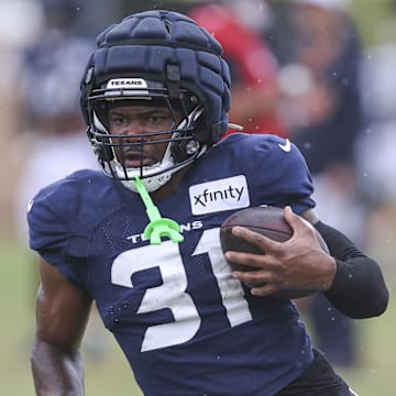 Jul 27, 2024; Houston, TX, USA; Houston Texans running back Dameon Pierce (31) during training camp at Houston Methodist Training Center. Mandatory Credit: Troy Taormina-USA TODAY Sports