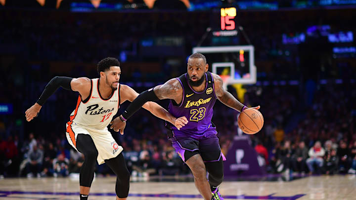 Dec 23, 2024; Los Angeles, California, USA; Los Angeles Lakers forward LeBron James (23) moves the ball against Detroit Pistons forward Tobias Harris (12) during the second half at Crypto.com Arena. Mandatory Credit: Gary A. Vasquez-Imagn Images Dec 23, 2024; Los Angeles, California, USA; Los Angeles Lakers forward LeBron James (23) moves the ball against Detroit Pistons forward Tobias Harris (12) during the second half at Crypto.com Arena. Mandatory Credit: Gary A. Vasquez-Imagn Images