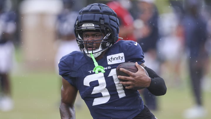 Jul 27, 2024; Houston, TX, USA; Houston Texans running back Dameon Pierce (31) during training camp at Houston Methodist Training Center. Mandatory Credit: Troy Taormina-USA TODAY Sports