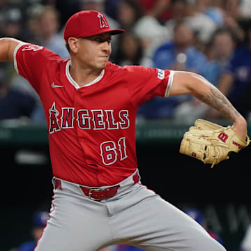 Apr 16, 2025; Arlington, Texas, USA; Los Angeles Angels relief pitcher Michael Darrell-Hicks (61) throws to the plate during the eighth inning against the Texas Rangers at Globe Life Field. Mandatory Credit: Raymond Carlin III-Imagn Images