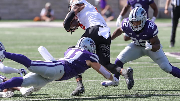 Linebacker Austin Moore (41) during the first quarter at Bill Snyder Family Football Stadium. Mandatory Credit: Scott Sewell-Imagn Images