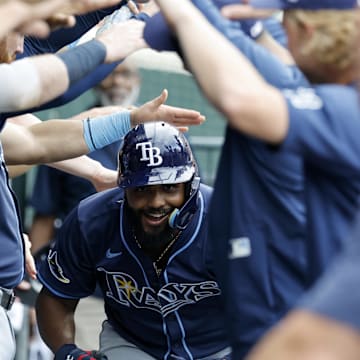 Jul 9, 2025; Detroit, Michigan, USA;  Tampa Bay Rays third baseman Junior Caminero (13) receives congratulations from teammates after he hits a home run in the seventh inning against the Detroit Tigers at Comerica Park. Mandatory Credit: Rick Osentoski-Imagn Images