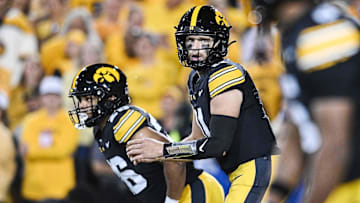 Oct 18, 2025; Iowa City, Iowa, USA; Iowa Hawkeyes quarterback Mark Gronowski (11) looks on against the Penn State Nittany Lions during the second quarter at Kinnick Stadium. Mandatory Credit: Jeffrey Becker-Imagn Images