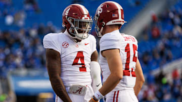 Alabama Crimson Tide quarterback Jalen Milroe (4) celebrates with quarterback Ty Simpson (15)