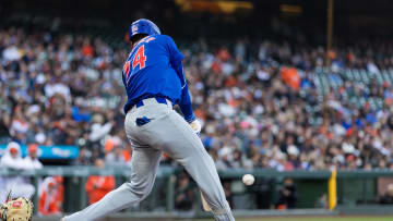 Jun 25, 2024; San Francisco, California, USA; Chicago Cubs right fielder Cody Bellinger (24) hits a single against the San Francisco Giants during the third inning at Oracle Park.