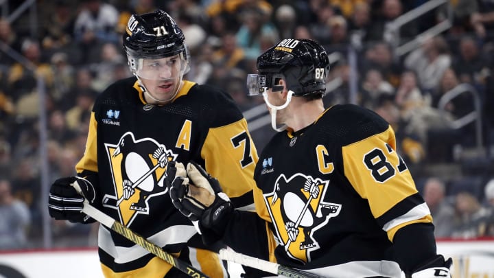 Oct 28, 2023; Pittsburgh, Pennsylvania, USA; Pittsburgh Penguins center Evgeni Malkin (71) listens to center Sidney Crosby (87) prior to a face-off against the Ottawa Senators during the first period at PPG Paints Arena. Mandatory Credit: Charles LeClaire-USA TODAY Sports