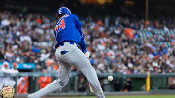 Jun 25, 2024; San Francisco, California, USA; Chicago Cubs right fielder Cody Bellinger (24) hits a single against the San Francisco Giants during the third inning at Oracle Park.