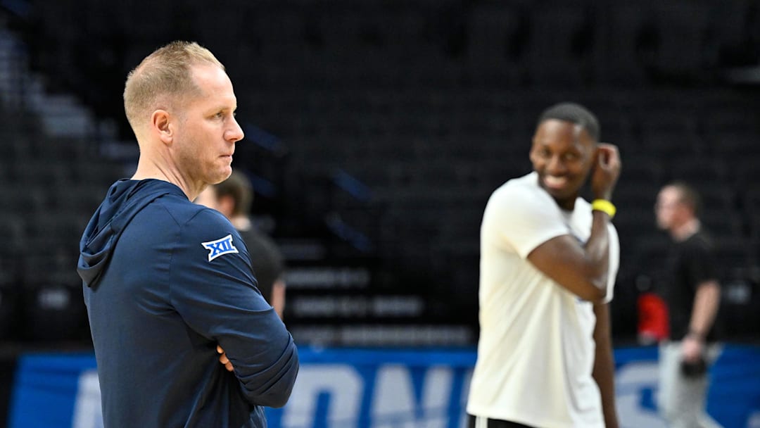 Mar 18, 2026; Portland, OR, USA; BYU Cougars head coach Kevin Young watches his team during a practice session ahead of the first round of the men's 2026 NCAA Tournament at Moda Center. Mandatory Credit: Craig Strobeck-Imagn Images