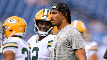 Sep 22, 2024; Nashville, Tennessee, USA;  Green Bay Packers quarterback Jordan Love (10) and Green Bay Packers quarterback Malik Willis (2) look on during pregame warmups before the game against the Tennessee Titans at Nissan Stadium. Mandatory Credit: Steve Roberts-Imagn Images
