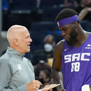 Jul 2, 2022; San Francisco, CA, USA; Sacramento Kings assistant coach Jay Triano talks to center Neemias Queta (88) during the third quarter against the Golden State Warriors at the California Summer League at Chase Center. Mandatory Credit: Darren Yamashita-Imagn Images