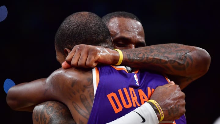 Oct 26, 2023; Los Angeles, California, USA; Phoenix Suns forward Kevin Durant (35) meets with Los Angeles Lakers forward LeBron James (23) following the game at Crypto.com Arena. Mandatory Credit: Gary A. Vasquez-USA TODAY Sports