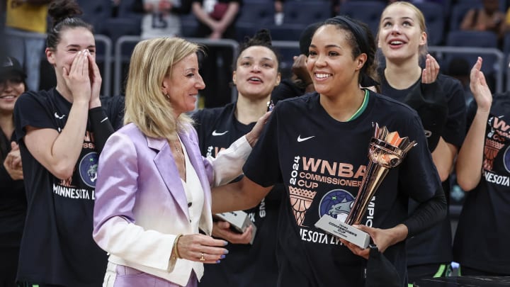 WNBA Commissioner Cathy Englebert gives the WNBA Commissioner’s Cup Championship MVP award to Minnesota Lynx forward Napheesa Collier.