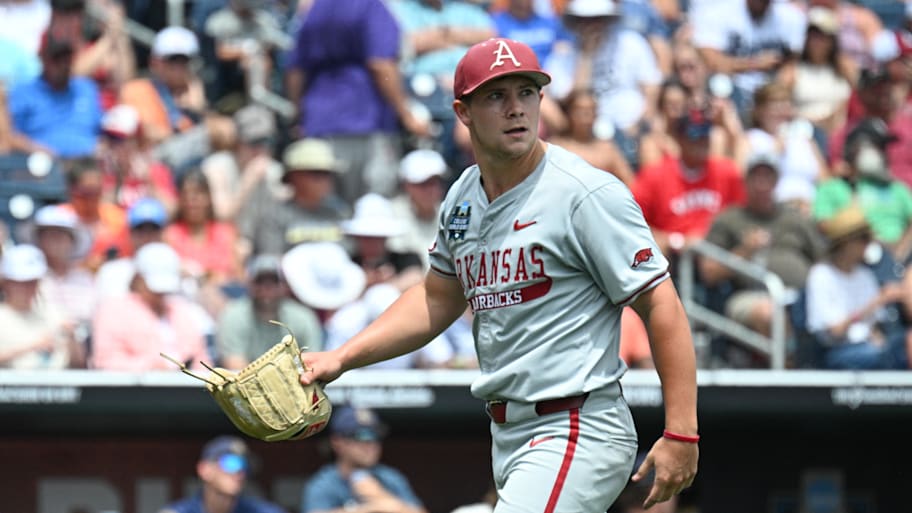 Arkansas Razorbacks starting pitcher Gage Wood (14) looks at the scoreboard. | Steven Branscombe-Imagn Images