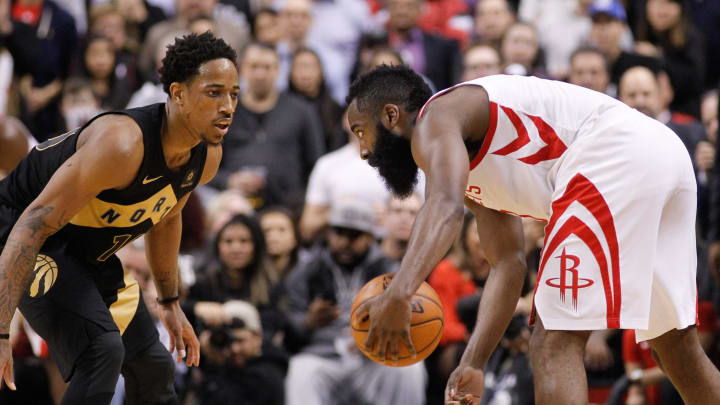 Mar 9, 2018; Toronto, Ontario, CAN; Toronto Raptors guard DeMar DeRozan (10) defends against Houston Rockets guard James Harden (13) at the Air Canada Centre. Toronto defeated Houston 108-105.Mandatory Credit: John E. Sokolowski-USA TODAY Sports