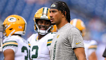 Sep 22, 2024; Nashville, Tennessee, USA;  Green Bay Packers quarterback Jordan Love (10) and Green Bay Packers quarterback Malik Willis (2) look on during pregame warmups before the game against the Tennessee Titans at Nissan Stadium. Mandatory Credit: Steve Roberts-Imagn Images