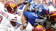 Sep 7, 2025; Landover, Maryland, USA; New York Giants wide receiver Wan'Dale Robinson (17) is tackled during the first quarter against the Washington Commanders at Northwest Stadium. Mandatory Credit: Amber Searls-Imagn Images