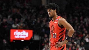 Jan 18, 2025; Portland, Oregon, USA;  Portland Trail Blazers guard Scoot Henderson (00) stands near center court during a break in play during the first half at Moda Center. Mandatory Credit: Brian Murphy-Imagn Images