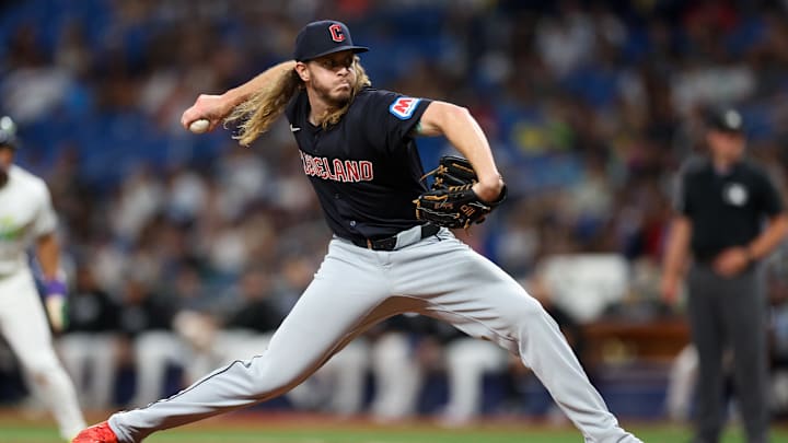 Jul 12, 2024; St. Petersburg, Florida, USA; Cleveland Guardians pitcher Scott Barlow (58) throws a pitch against the Tampa Bay Rays in the sixth inning at Tropicana Field. Mandatory Credit: Nathan Ray Seebeck-Imagn Images