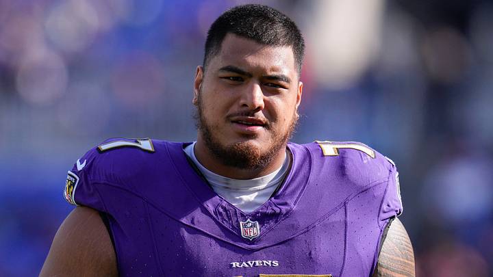 Nov 12, 2023; Baltimore, Maryland, USA;  Baltimore Ravens offensive tackle Daniel Faalele (77) looks on before a game against the Cleveland Browns at M&T Bank Stadium.