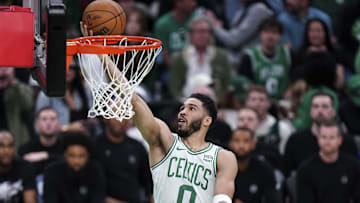 Boston Celtics forward Jayson Tatum (0) shoots the ball.