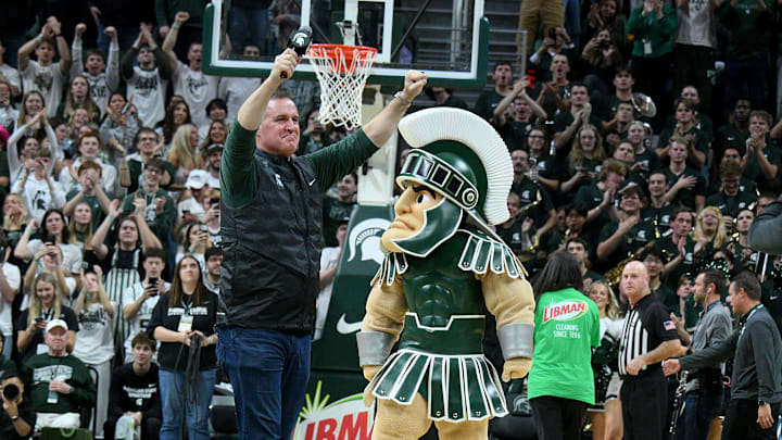 Dec 2, 2025; East Lansing, Michigan, USA;  Michigan State head football coach Pat Fitzgerald watches the Spartans defeat the Iowa Hawkeyes at Jack Breslin Student Events Center. Mandatory Credit: Dale Young-Imagn Images