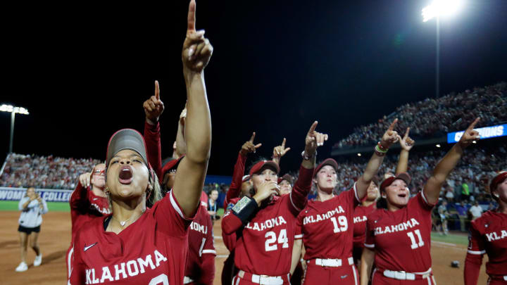 Oklahoma celebrates its 2024 Women's College World Series championship win over Texas.