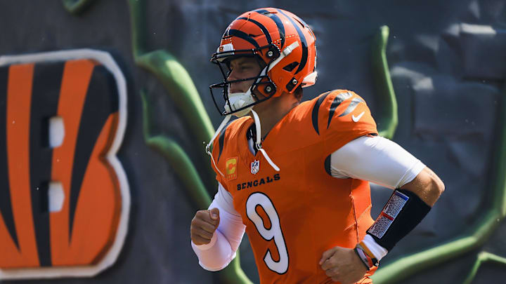 Sep 14, 2025; Cincinnati, Ohio, USA; Cincinnati Bengals quarterback Joe Burrow (9) runs onto the field before the game against the Jacksonville Jaguars at Paycor Stadium. Mandatory Credit: Katie Stratman-Imagn Images