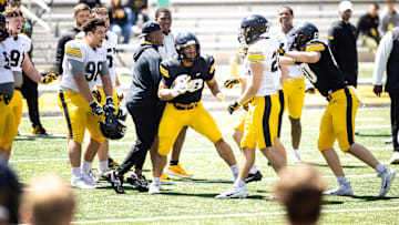 Apr 26, 2025; Iowa City, IA, USA; Desmond King reacts as Iowa running back Kamari Moulton (28) gets tackled during a spring NCAA football open practice at Kinnick Stadium. Mandatory Credit: Joseph Cress/For the Register