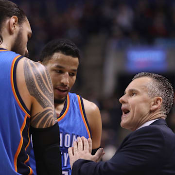 Mar 16, 2017; Toronto, Ontario, CAN; Oklahoma City Thunder head coach Billy Donovan talks to center Steven Adams (12) and forward Andre Roberson (21) against the Toronto Raptors at Air Canada Centre. The Thunder beat the Raptors 123-102. Mandatory Credit: Tom Szczerbowski-Imagn Images