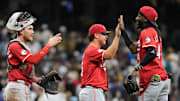 Sep 26, 2025; Milwaukee, Wisconsin, USA;  Cincinnati Reds shortstop Elly De La Cruz (44) high fives teammates following the game against the Milwaukee Brewers at American Family Field. Mandatory Credit: Jeff Hanisch-Imagn Images