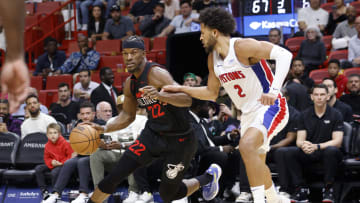 Mar 5, 2024; Miami, Florida, USA; Detroit Pistons guard Cade Cunningham (2) defends Miami Heat forward Jimmy Butler (22) during the second half at Kaseya Center. Mandatory Credit: Rhona Wise-USA TODAY Sports