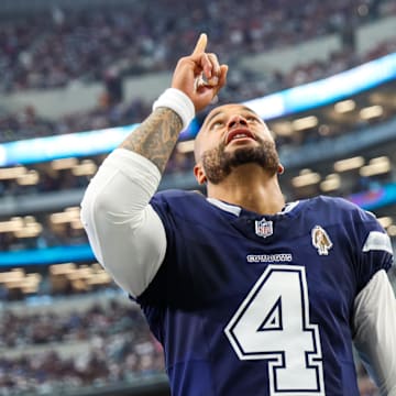 Dallas Cowboys quarterback Dak Prescott prays before the game against the Detroit Lions.