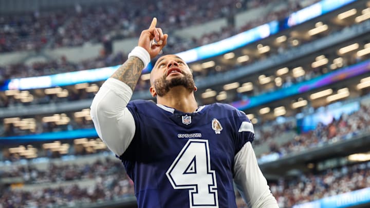 Oct 13, 2024; Arlington, Texas, USA; Dallas Cowboys quarterback Dak Prescott (4) prays before the game against the Detroit Lions at AT&T Stadium. Mandatory Credit: Kevin Jairaj-Imagn Images