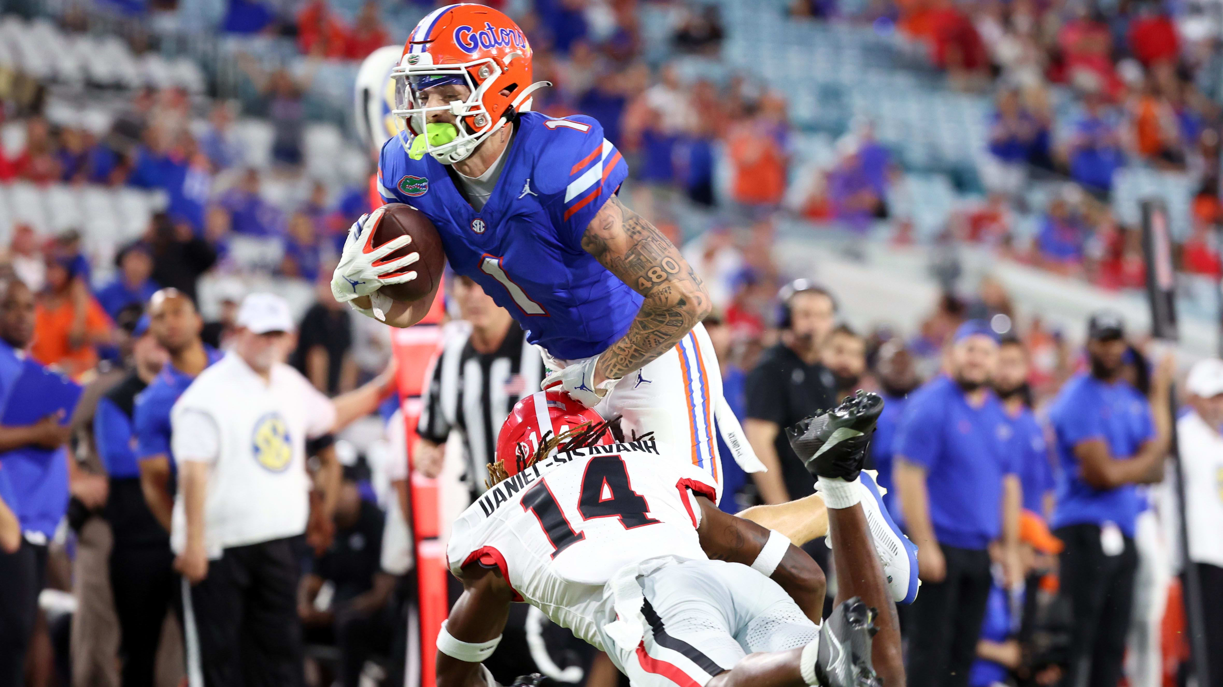Florida Gators wide receiver Ricky Pearsall is tackled by a Georgia defender.