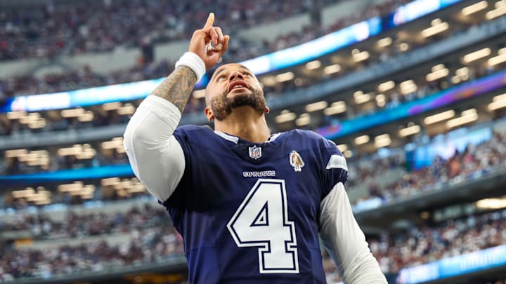 Dallas Cowboys quarterback Dak Prescott prays before the game against the Detroit Lions. Dallas Cowboys quarterback Dak Prescott prays before the game against the Detroit Lions.