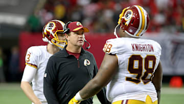 Oct 11, 2015; Atlanta, GA, USA; Washington Redskins head coach Jay Gruden talks with defensive tackle Terrance Knighton (98) in the fourth quarter of their game against the Atlanta Falcons at the Georgia Dome. The Falcons won 25-19 in overtime. Mandatory Credit: Jason Getz-Imagn Images