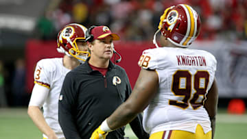 Oct 11, 2015; Atlanta, GA, USA; Washington Redskins head coach Jay Gruden talks with defensive tackle Terrance Knighton (98) in the fourth quarter of their game against the Atlanta Falcons at the Georgia Dome. The Falcons won 25-19 in overtime. Mandatory Credit: Jason Getz-Imagn Images