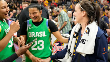 Indiana Fever guard Caitlin Clark talks to the Brazilian National Team after the Fever defeated Brazil in a preseason game