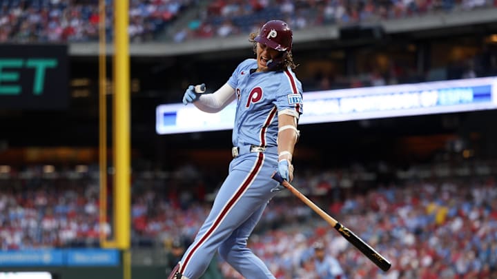 Aug 29, 2024; Philadelphia, Pennsylvania, USA; Philadelphia Phillies third base Alec Bohm (28) is injured while swinging at a pitch during the first inning against the Atlanta Braves at Citizens Bank Park.