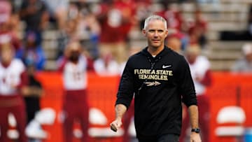 Nov 29, 2025; Gainesville, Florida, USA; Florida State Seminoles head coach Mike Norvell walks on the field before a game against the Florida Gators at Ben Hill Griffin Stadium. Mandatory Credit: Matt Pendleton-Imagn Images